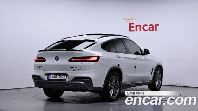 BMW X4 2021 — Фото 2/20
