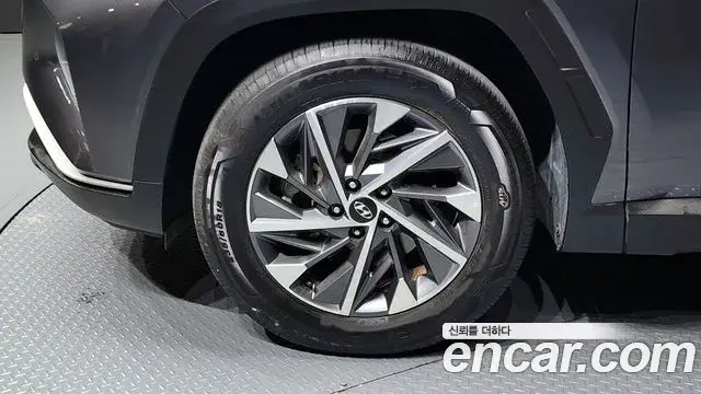 Hyundai Tucson Hybrid 2021 — ფოტო 18/20