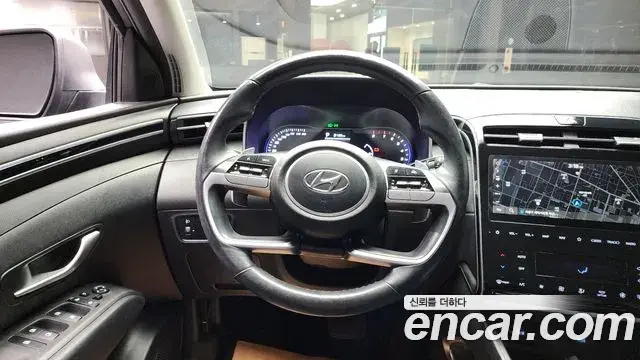 Hyundai Tucson Hybrid 2021 — ფოტო 17/20