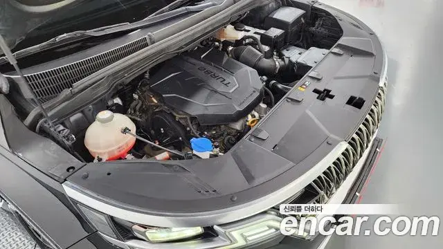 Kia Carnival 2021 — ფოტო 18/20