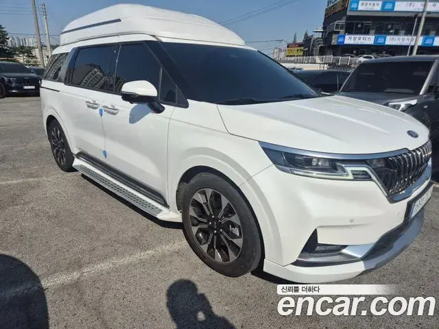 Kia Carnival 2021 — ფოტო 16/20
