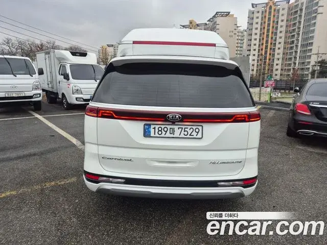 Kia Carnival 2021 — ფოტო 19/20