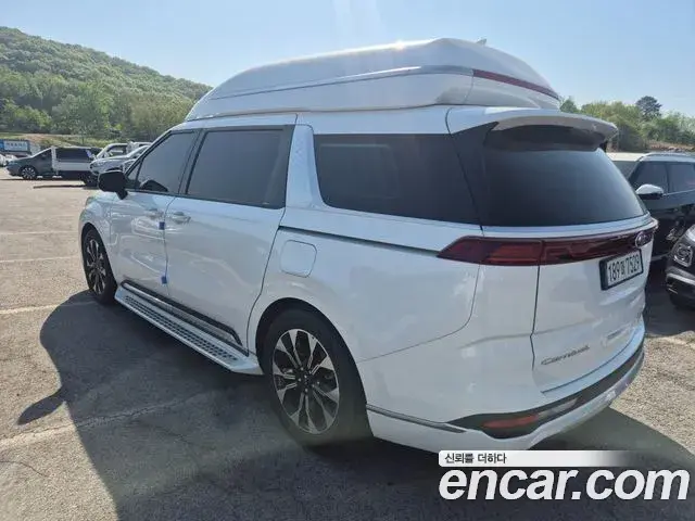 Kia Carnival 2021 — ფოტო 1/20