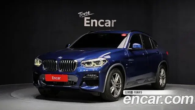 BMW X4 2021 — Фото 1/20
