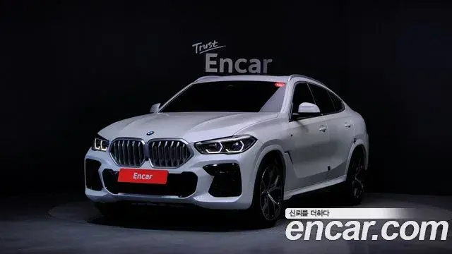 BMW X6 2023 — Фото 1/20