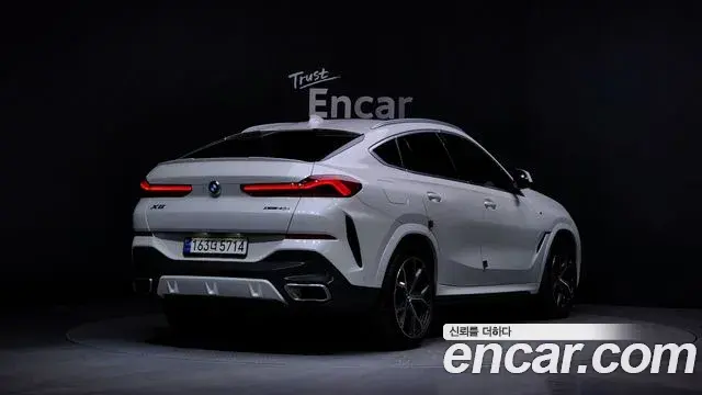 BMW X6 2023 — Фото 2/20