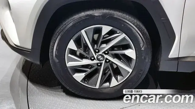 Hyundai Tucson Hybrid 2022 — ფოტო 9/20
