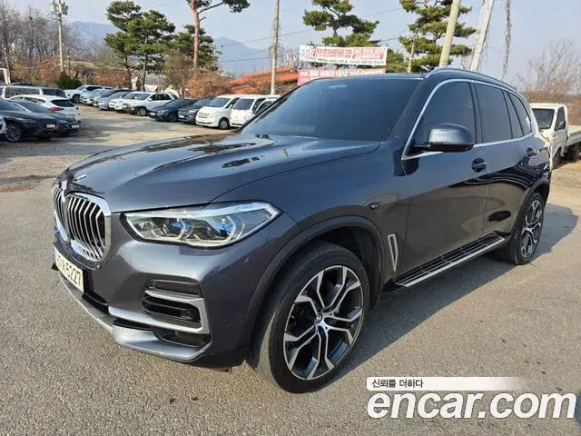BMW X5 2022 — ფოტო 14/20