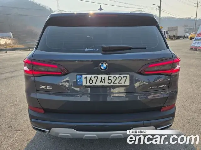 BMW X5 2022 — ფოტო 15/20