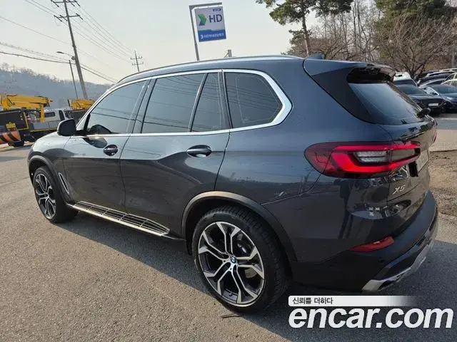 BMW X5 2022 — ფოტო 13/20
