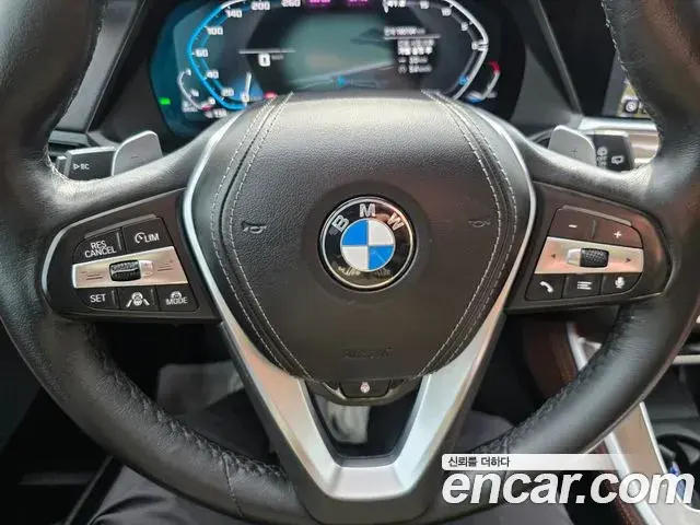 BMW X5 2022 — ფოტო 18/20