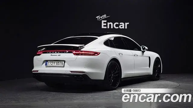 Porsche Panamera 2020 — Фото 1/20