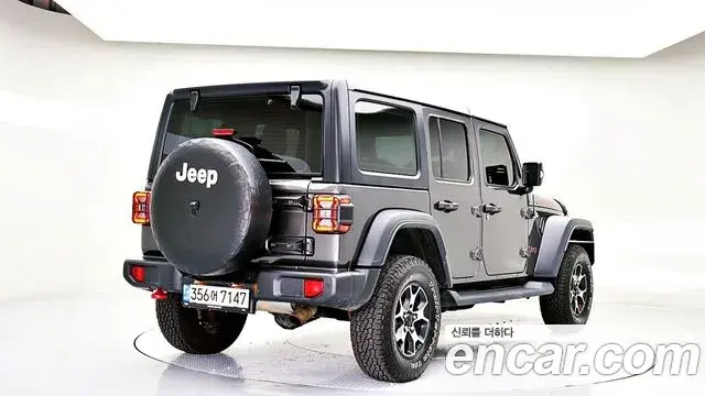 Jeep Wrangler 2022 — ფოტო 7/20