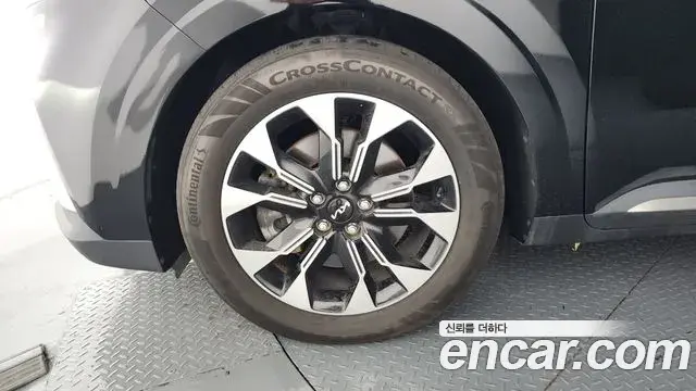 Kia Carnival 2021 — ფოტო 6/20