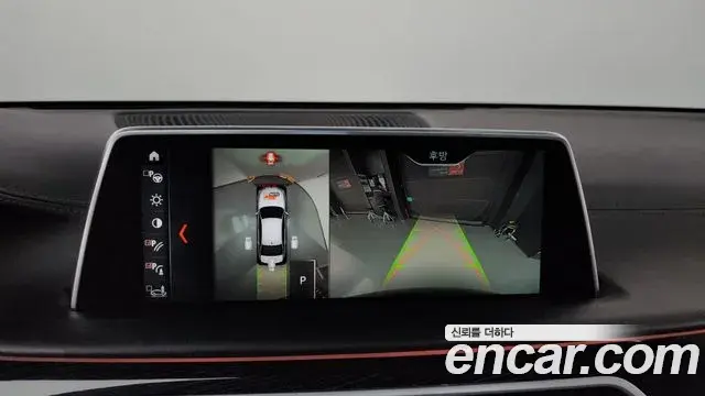 BMW 7 Series 2018 — ფოტო 35/43