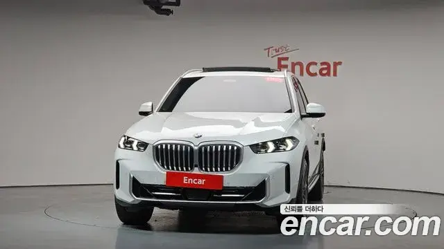BMW X5 2024 — ფოტო 16/34