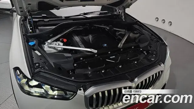 BMW X5 2024 — ფოტო 28/34