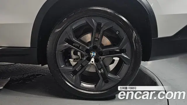 BMW X5 2024 — ფოტო 14/34