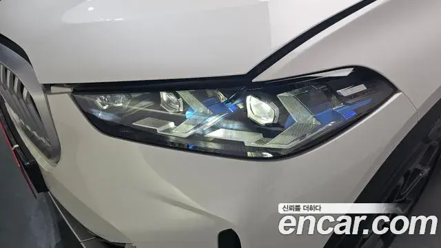 BMW X5 2024 — ფოტო 23/34