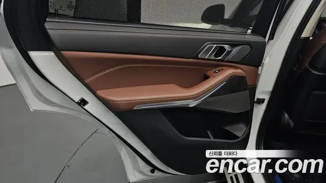 BMW X5 2024 — ფოტო 25/34
