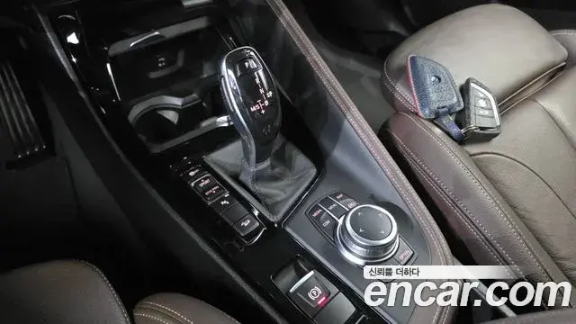 BMW X1 2022 — ფოტო 18/32