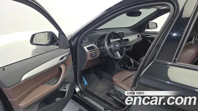 BMW X1 2022 — ფოტო 11/32