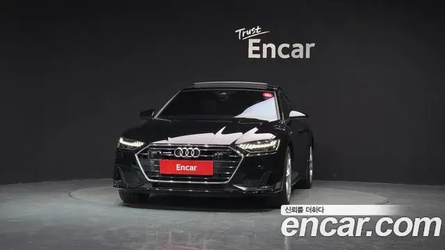 Audi A7 2023 — ფოტო 29/33