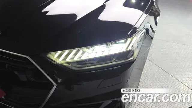 Audi A7 2023 — ფოტო 26/33