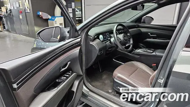 Hyundai Tucson Hybrid 2022 — ფოტო 11/20