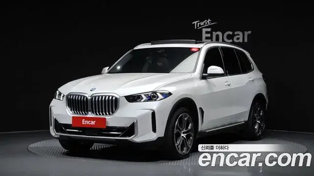 BMW X5 2023 — Фото 1/20