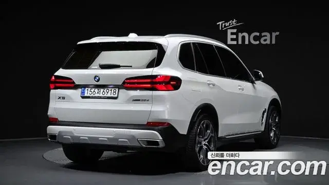 BMW X5 2023 — Фото 2/20