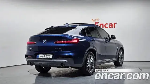BMW X4 2021 — Фото 2/20