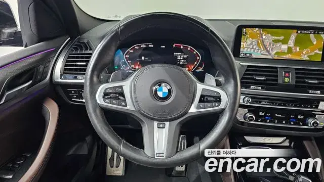 BMW X4 2021 — Фото 12/20