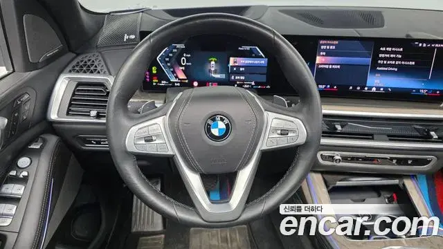 BMW X7 2023 — ფოტო 13/42