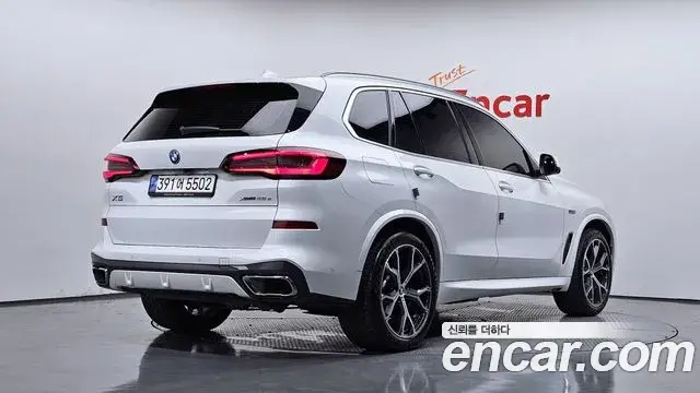 BMW X5 2023 — Фото 1/20