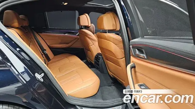BMW 5 Series 2023 — Фото 12/20