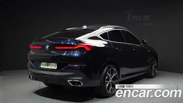 BMW X6 2022 — Фото 1/20