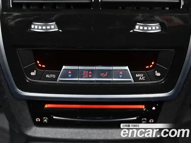 BMW X7 2021 — ფოტო 17/20
