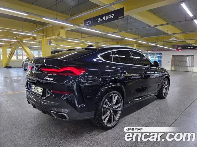 BMW X6 2021 — Фото 1/20