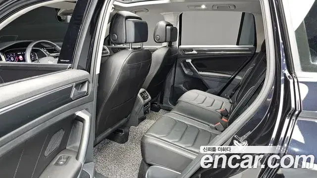 Volkswagen Tiguan 2021 — ფოტო 6/32