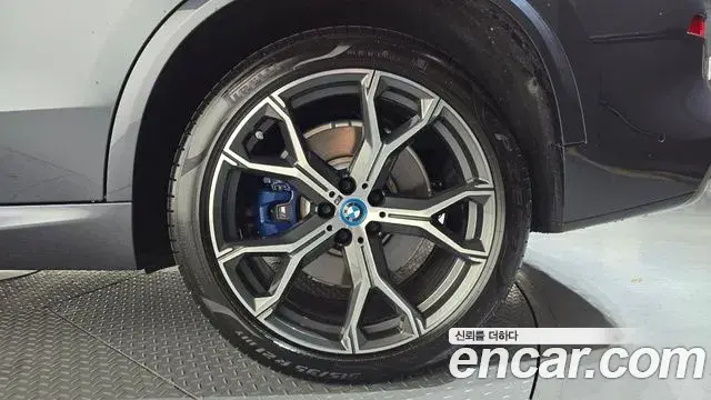 BMW X5 2022 — ფოტო 16/33