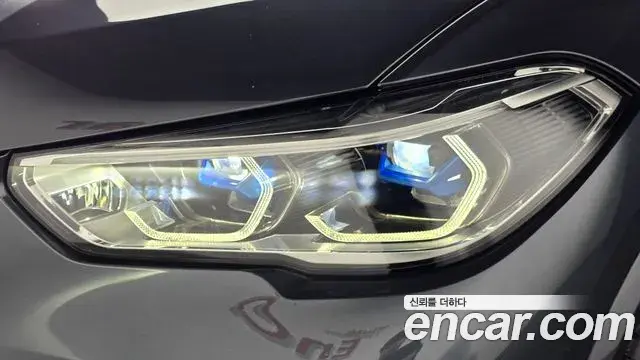 BMW X5 2022 — ფოტო 19/33