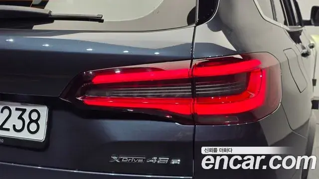 BMW X5 2022 — ფოტო 14/33