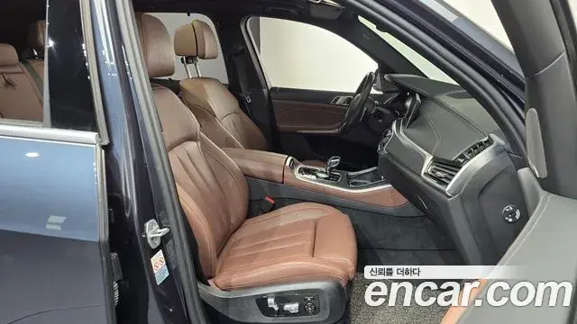 BMW X5 2022 — ფოტო 30/33