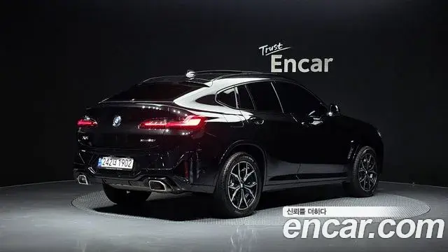BMW X4 2022 — ფოტო 4/20