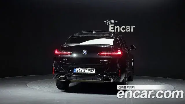 BMW X4 2022 — ფოტო 6/20