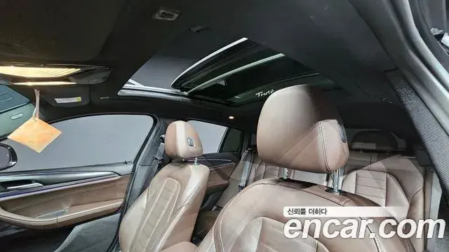 BMW X4 2022 — ფოტო 8/20