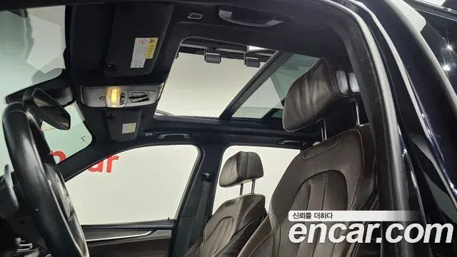 BMW X5 2018 — ფოტო 21/34