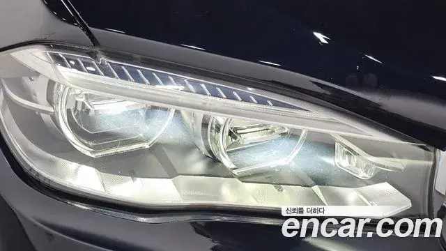 BMW X5 2018 — ფოტო 31/34