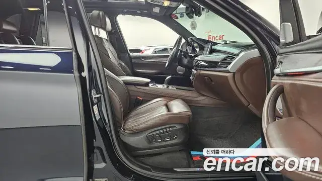 BMW X5 2018 — ფოტო 7/34